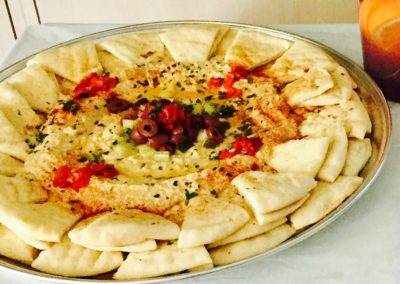 Pita and hummus on a silver platter at Mondays At Racine event Wendy Kaplan, RD
