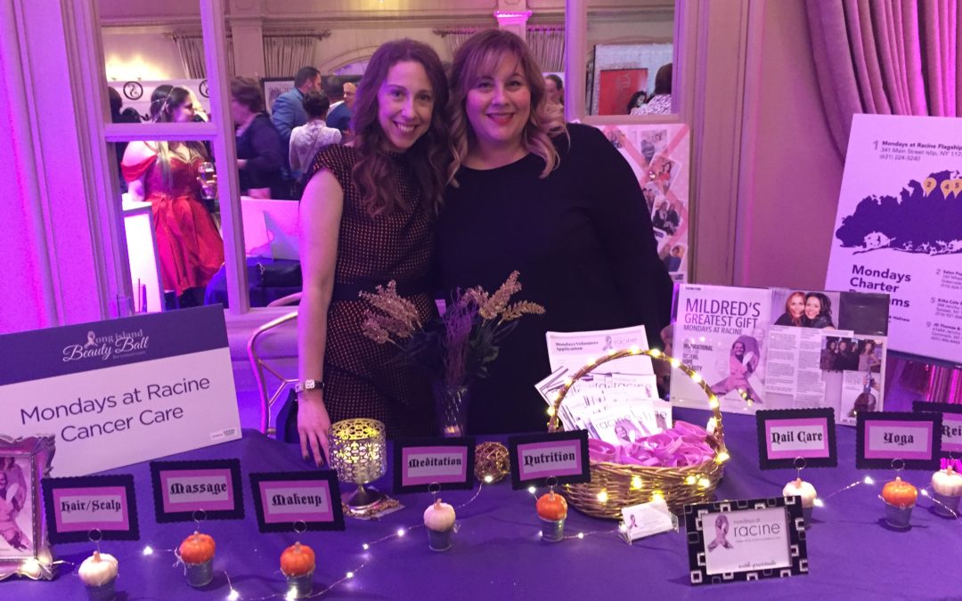 Wendy Kaplan RD Mondays At Racine event with friend in back of purple table highlighting the services available at Mondays At Racine